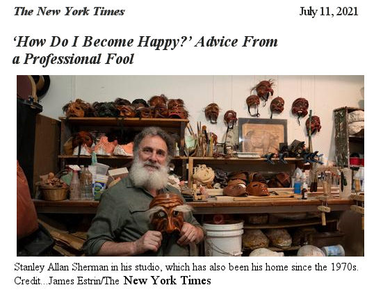 Stanley Allan Sherman in his studio, which has also been his home since the 1970s. Credit . . . James Estrin/The New York Times.  (Stanley behind him a work bench with masks on the wall , and shelf  tools, clamps, knives, on the bench, 5 gallon buckets