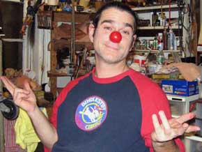 Keith Nelson trying on his finished clown nose for the first time